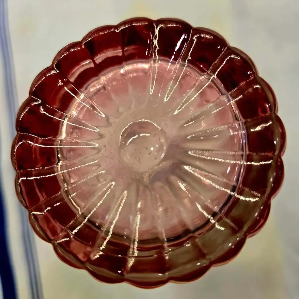 Vintage Pressed Pink Glass Bitters Bottle with Embossed Crest and Fluted Base
